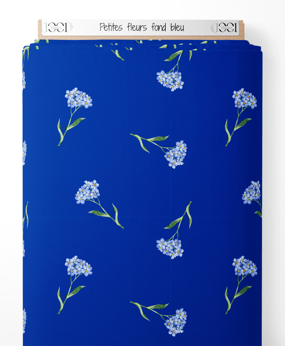 Tissu - Petites fleurs sur fond bleu