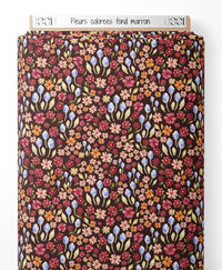 Tissu - Fleurs colorées sur fond marron