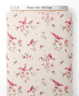 Tissu - Oiseaux roses sur fond beige