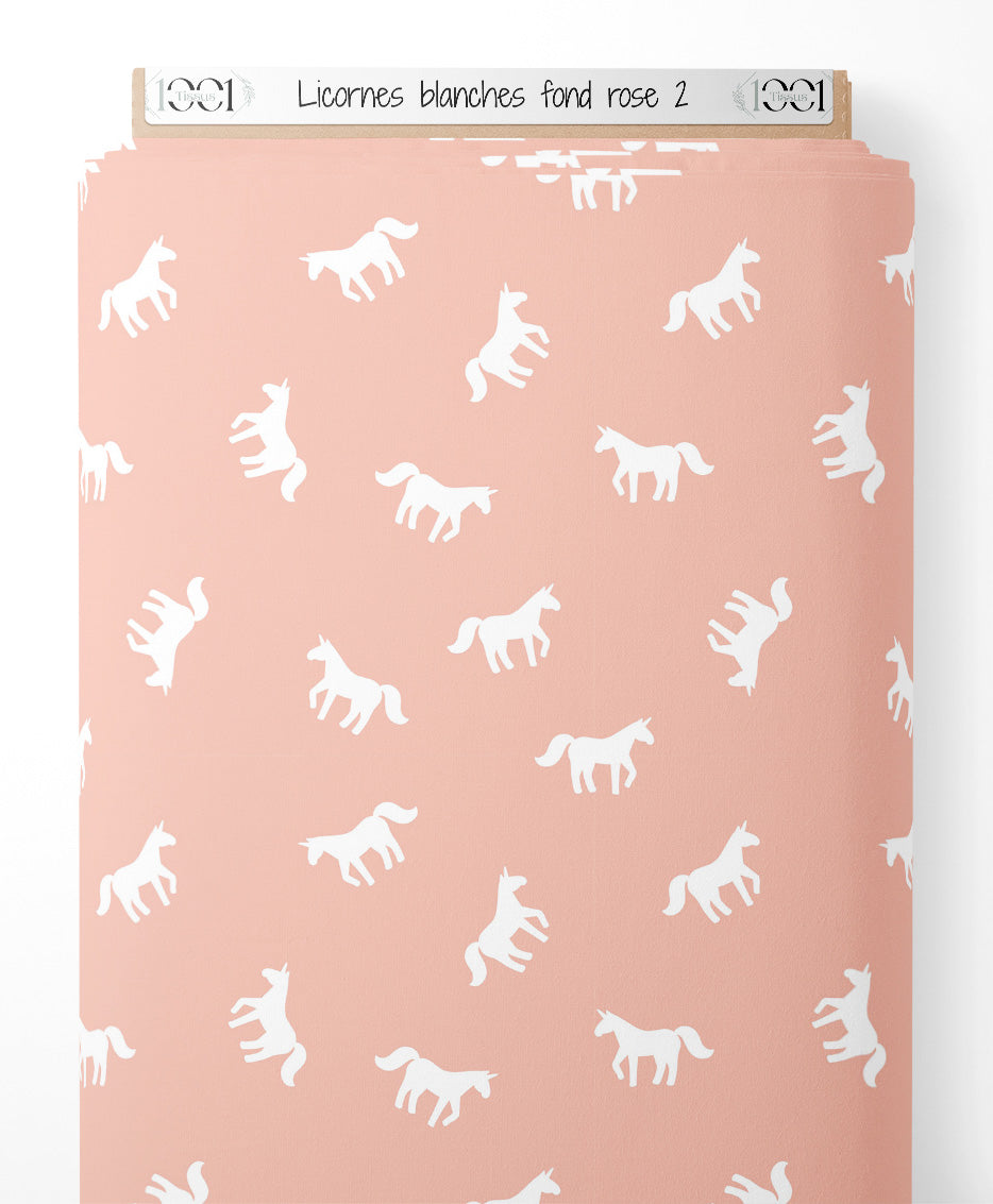 Tissu - Licornes blanches sur fond rose 2
