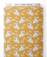 Tissu - Koalas et feuillages sur fond ocre