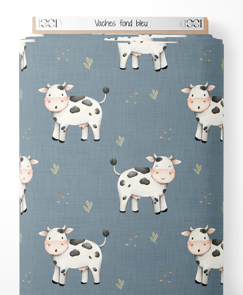 Tissu - Vaches sur fond bleu