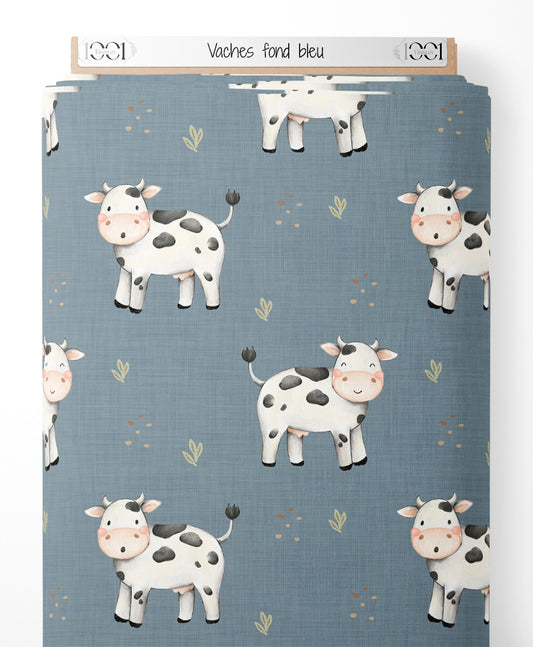 Tissu - Vaches sur fond bleu