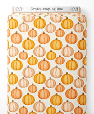 Tissu - Citrouilles orange sur blanc