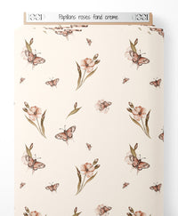 Tissu - Papillons roses sur fond crème