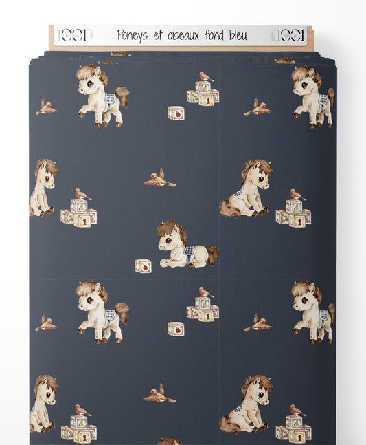 Tissu - Poneys et oiseaux sur fond bleu