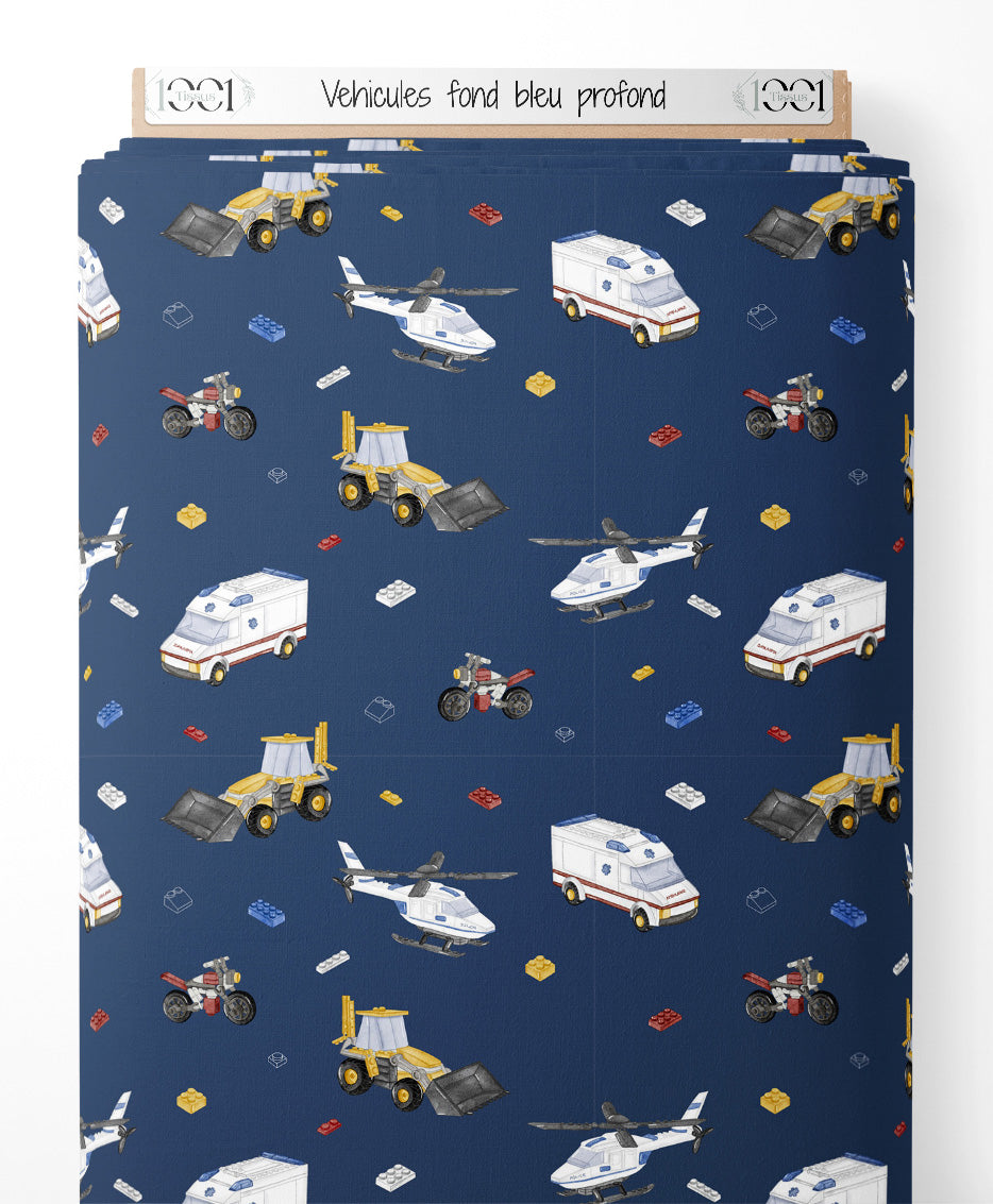 Tissu - Véhicules sur fond bleu profond