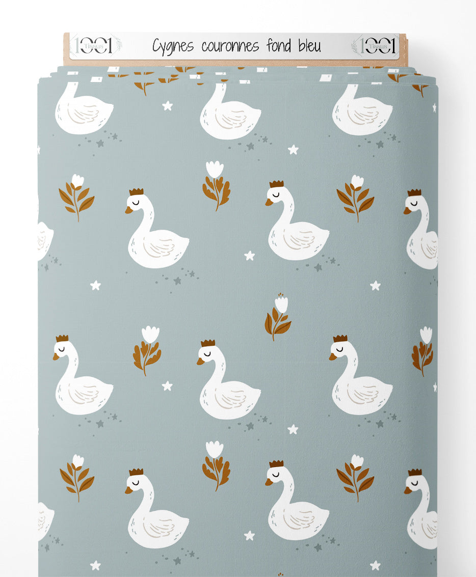 Tissu - Cygnes couronnés sur fond bleu