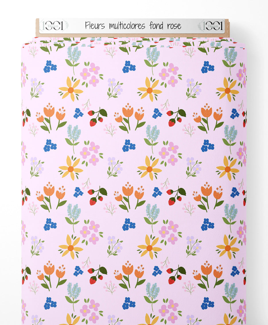 Tissu - Fleurs multicolores sur fond rose