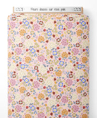 Tissu - Fleurs douces sur rose pâle