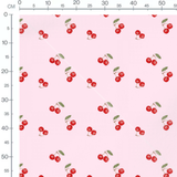 Tissu - Cerises rouges sur fond rose