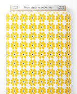 Tissu - Fleurs jaunes au centre bleu