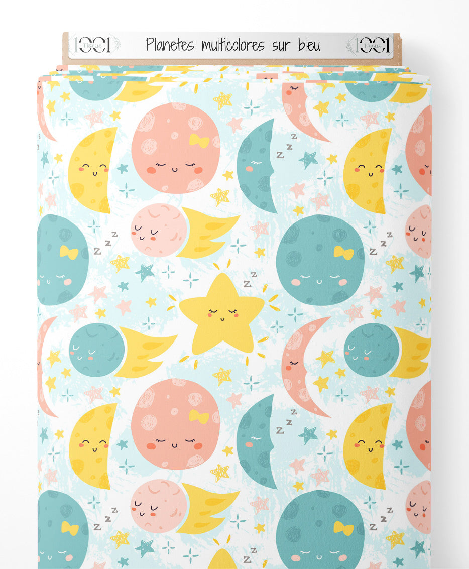 Tissu - Planètes multicolores sur bleu