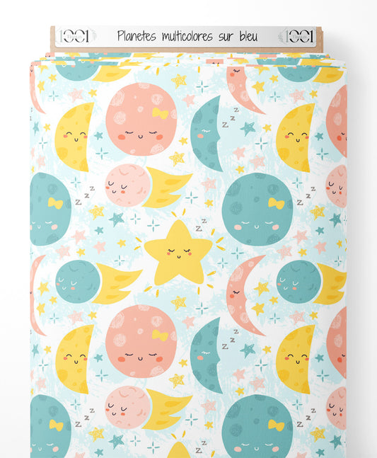 Tissu - Planètes multicolores sur bleu