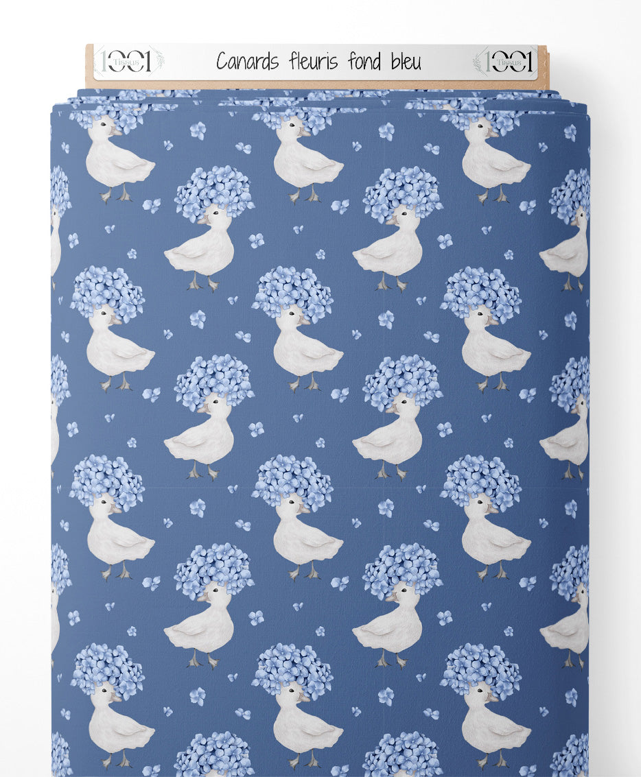 Tissu - Canards fleuris sur fond bleu
