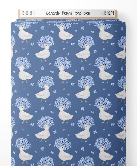 Tissu - Canards fleuris sur fond bleu