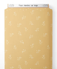 Tissu - Fleurs blanches sur beige