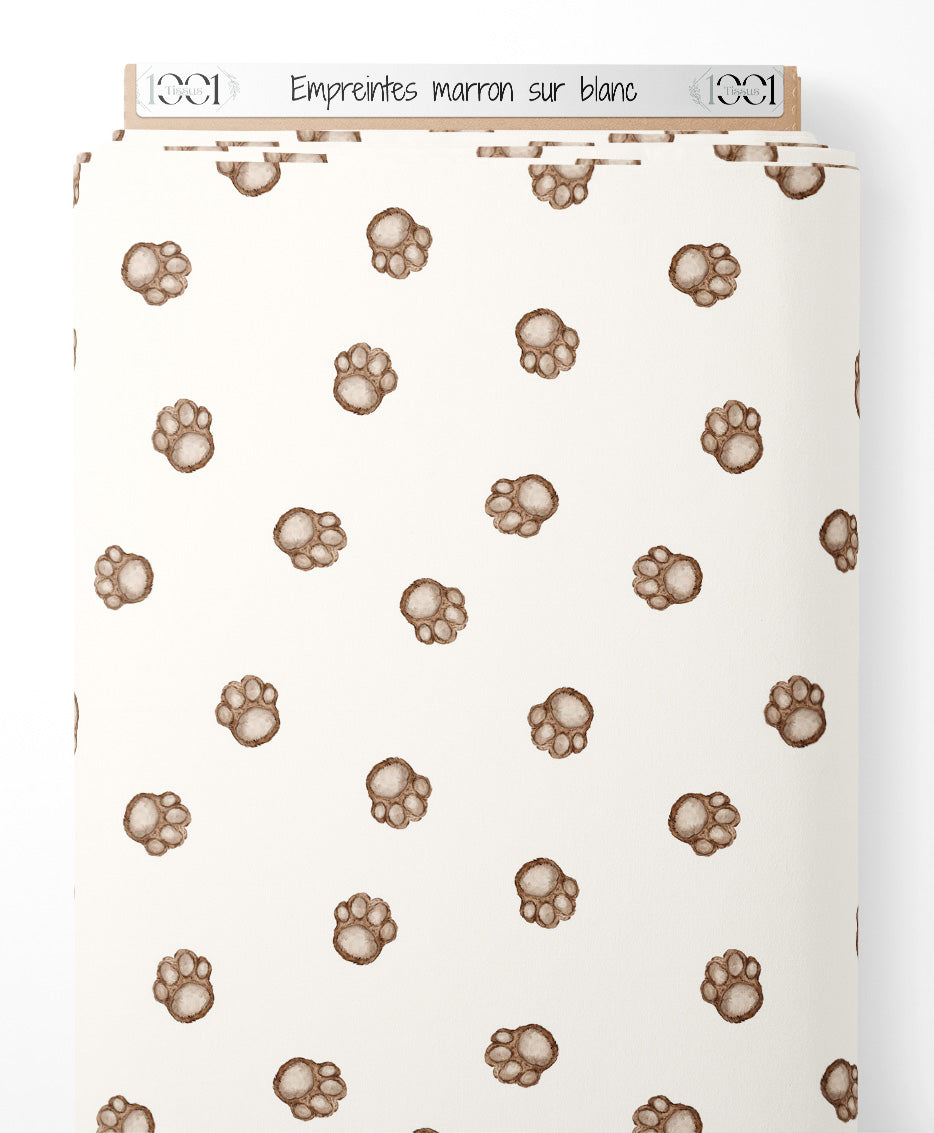 Tissu - Empreintes marron sur blanc