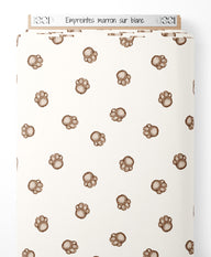 Tissu - Empreintes marron sur blanc