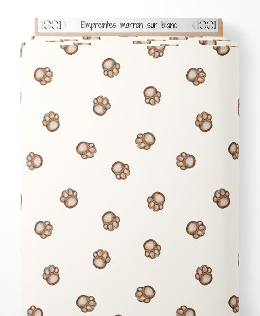 Tissu - Empreintes marron sur blanc