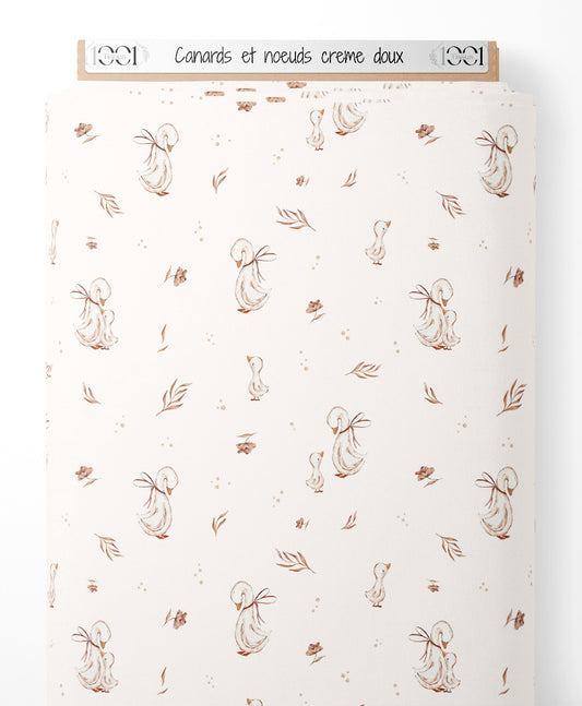Tissu - Canards et nœuds crème doux