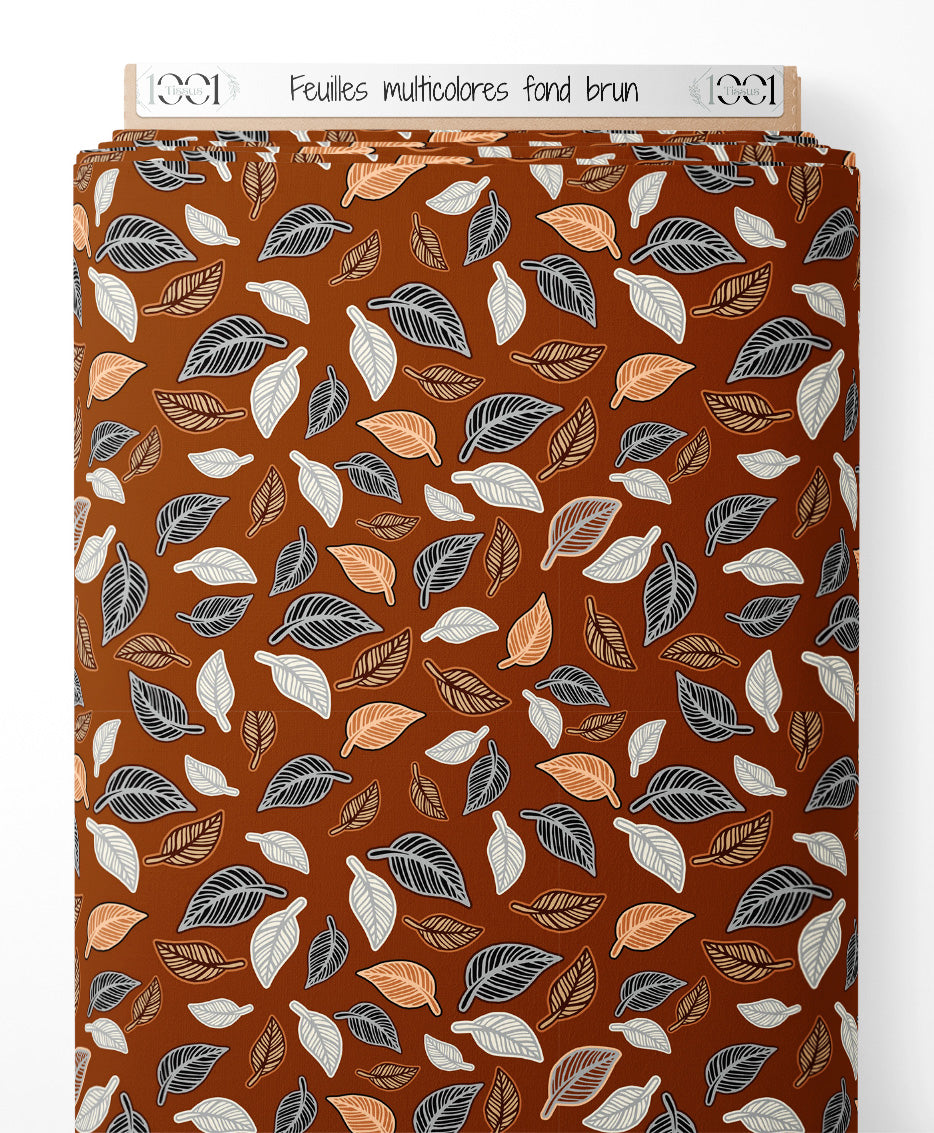 Tissu - Feuilles multicolores sur fond brun