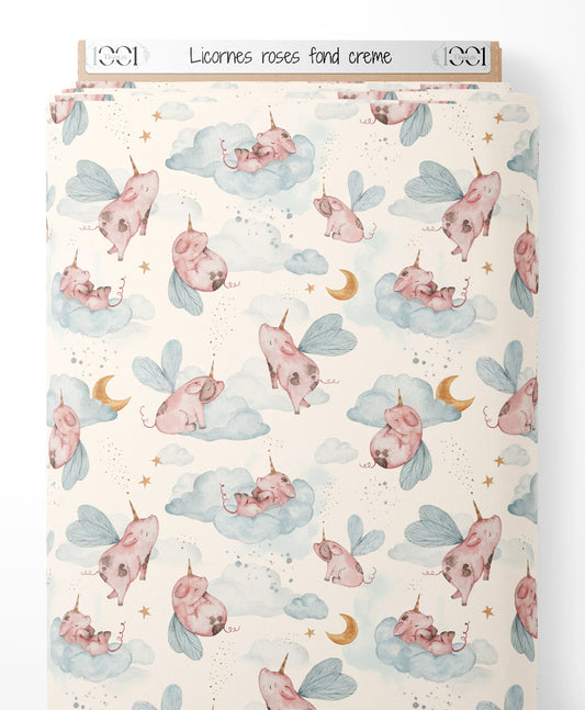 Tissu - Licornes roses sur fond crème