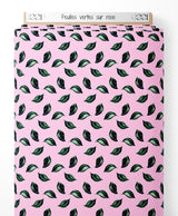 Tissu - Feuilles vertes sur rose