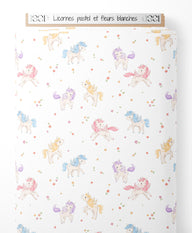 Tissu - Licornes pastel et fleurs blanches