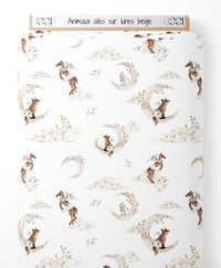 Tissu - Animaux ailés sur lunes beige