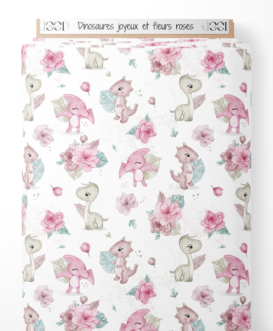 Tissu - Dinosaures joyeux et fleurs roses