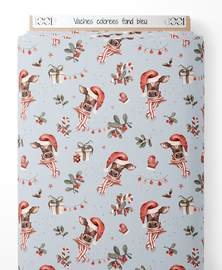 Tissu - Vaches colorées sur fond bleu