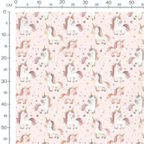 Tissu - Licornes blanches sur fond rose