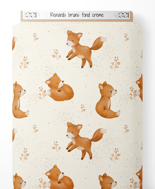 Tissu - Renards bruns sur fond crème
