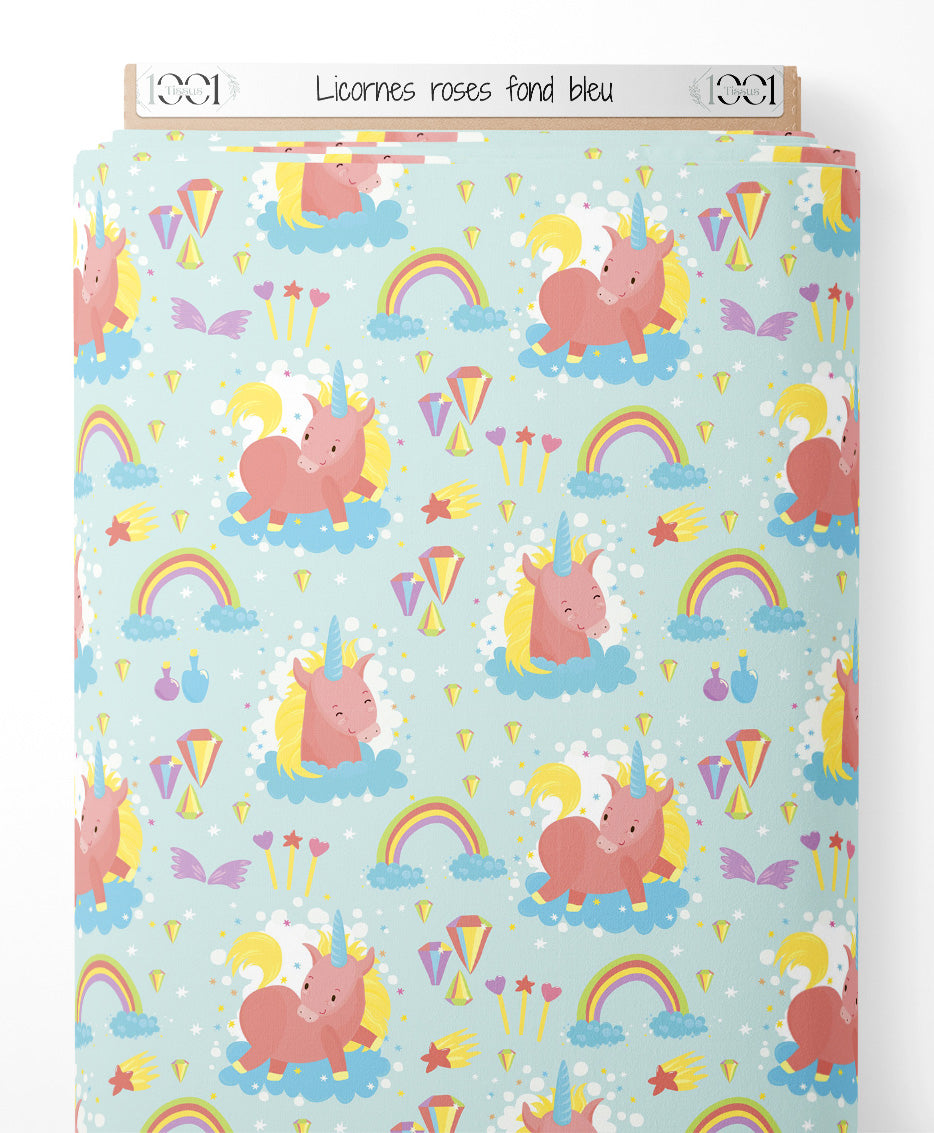 Tissu - Licornes roses sur fond bleu