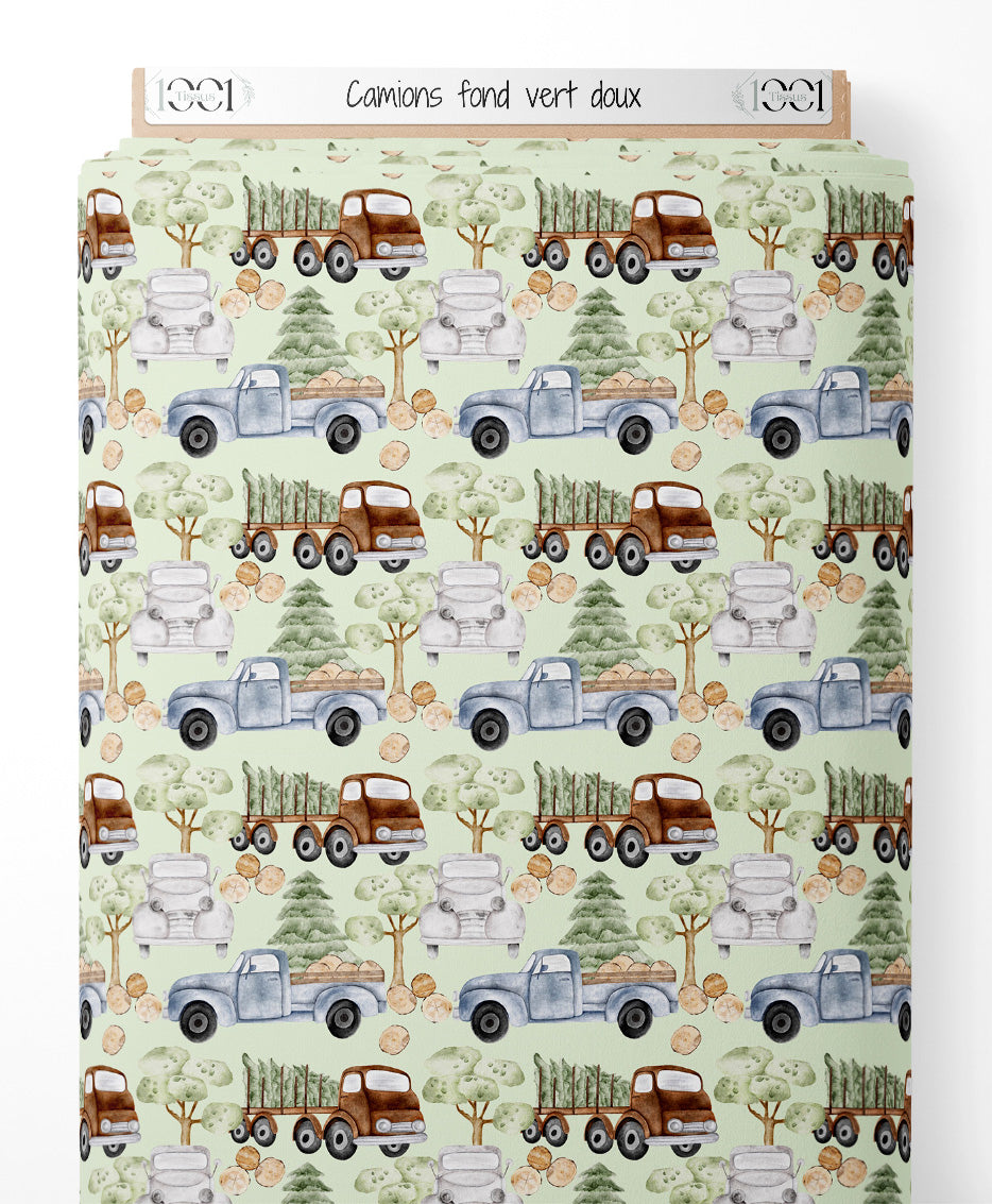 Tissu - Camions sur fond vert doux