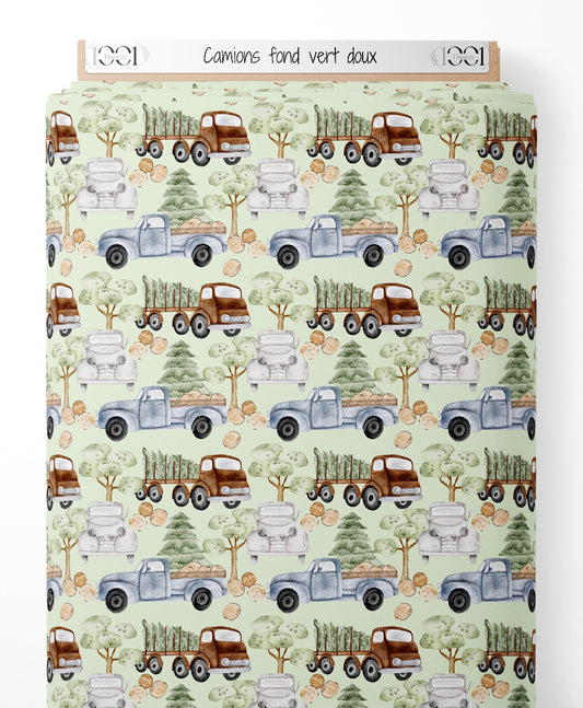 Tissu - Camions sur fond vert doux