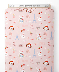 Tissu - Lapins gourmands sur rose