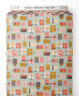 Tissu - Cadeaux multicolores sur fond vert