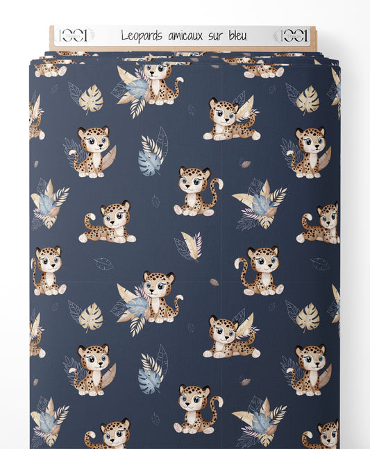 Tissu - Léopards amicaux sur bleu