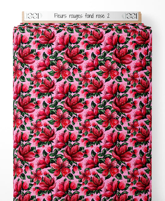 Tissu - Fleurs rouges sur fond rose 2