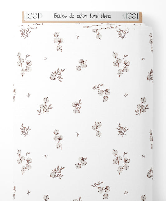 Tissu - Boules de coton sur fond blanc