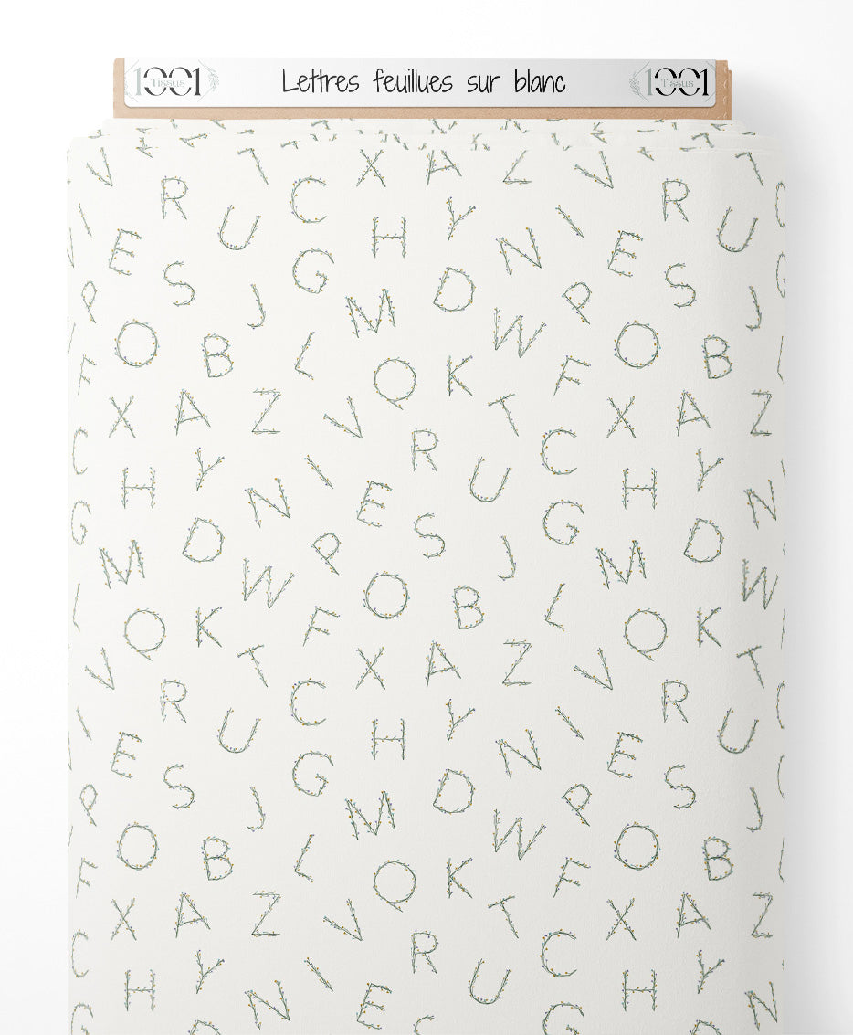 Tissu - Lettres feuillues sur blanc