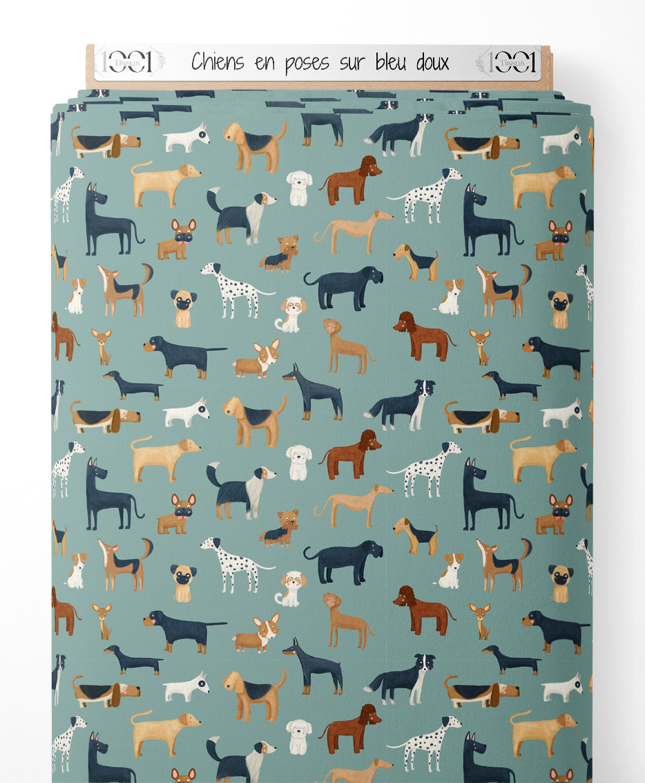 Tissu - Chiens en poses sur bleu doux