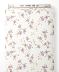 Tissu - Fleurs violettes sur fond clair