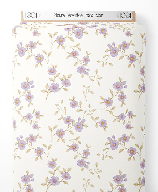 Tissu - Fleurs violettes sur fond clair