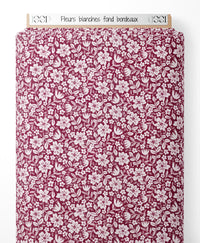Tissu - Fleurs blanches sur fond bordeaux