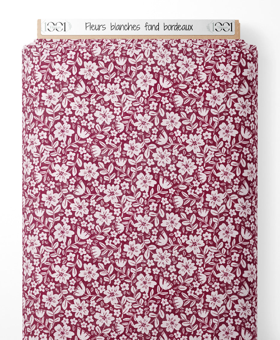 Tissu - Fleurs blanches sur fond bordeaux
