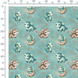 Tissu - Dinosaures adorables sur fond bleu