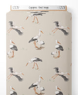 Tissu - Cigognes sur fond beige